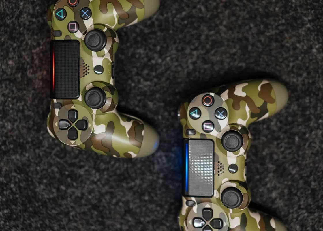 Two game controllers on a table
